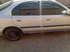 Сүрөт унаа Mitsubishi Carisma