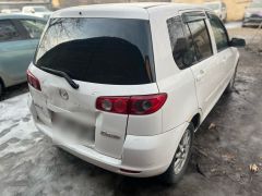 Photo of the vehicle Mazda Demio