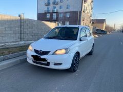 Photo of the vehicle Mazda Demio