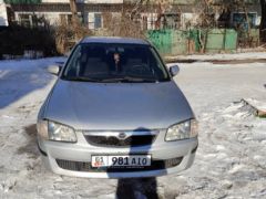 Photo of the vehicle Mazda 323