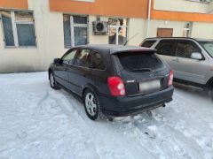 Сүрөт унаа Mazda 323