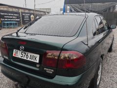 Фото авто Mazda Capella