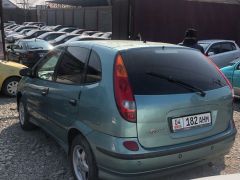 Photo of the vehicle Nissan Almera Tino