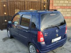 Сүрөт унаа Opel Agila