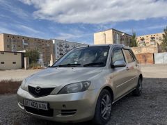 Сүрөт унаа Mazda Demio