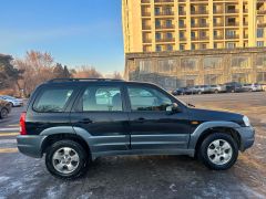 Photo of the vehicle Mazda Tribute