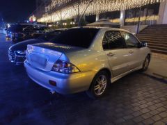 Сүрөт унаа Mitsubishi Lancer