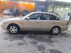 Фото авто Mazda 626