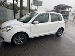 Photo of the vehicle Mazda Demio