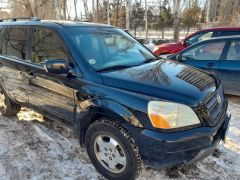 Photo of the vehicle Honda Pilot