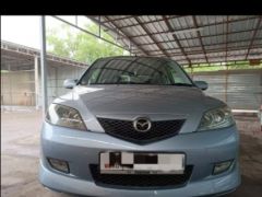 Фото авто Mazda Demio