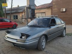 Сүрөт унаа Mazda 323