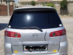 Photo of the vehicle Mazda Demio