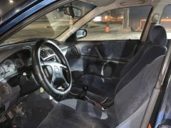 Сүрөт унаа Mazda 323