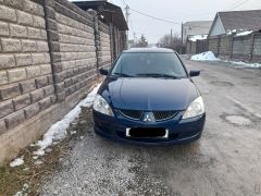 Фото авто Mitsubishi Lancer