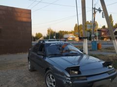 Сүрөт унаа Mazda 323