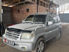 Сүрөт унаа Mitsubishi Pajero iO