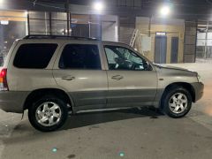 Photo of the vehicle Mazda Tribute