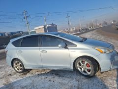 Photo of the vehicle Toyota Prius v (+)