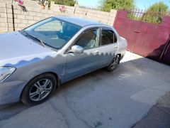 Сүрөт унаа Mitsubishi Lancer