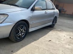 Сүрөт унаа Mitsubishi Lancer