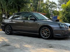 Фото авто Subaru Impreza WRX STi