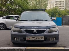 Фото авто Mazda 323