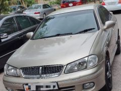 Фото авто Nissan Bluebird