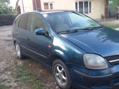 Photo of the vehicle Nissan Almera Tino