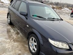 Фото авто Mazda Protege