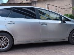 Фото авто Toyota Prius v (+)