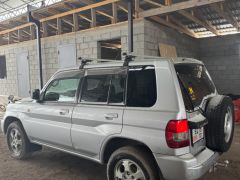 Сүрөт унаа Mitsubishi Pajero iO