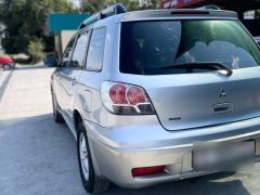 Сүрөт унаа Mitsubishi Outlander