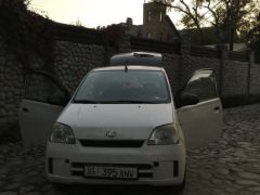 Photo of the vehicle Daihatsu Cuore