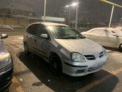 Photo of the vehicle Nissan Almera Tino