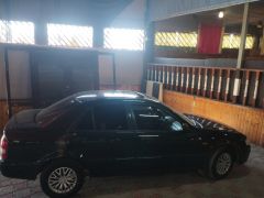 Сүрөт унаа Mazda 323