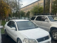 Фото авто Mitsubishi Lancer