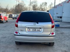 Сүрөт унаа Nissan Almera Tino