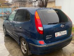 Photo of the vehicle Nissan Almera Tino