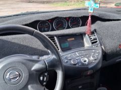 Фото авто Nissan Primera