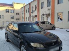 Сүрөт унаа Mazda 323