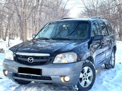 Photo of the vehicle Mazda Tribute