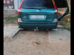 Photo of the vehicle Nissan Almera Tino