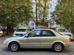 Сүрөт унаа Mazda 323