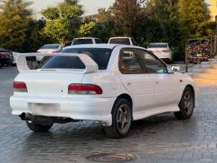 Фото авто Subaru Impreza WRX
