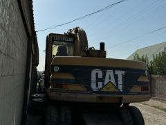 Фото авто Caterpillar M315