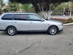 Photo of the vehicle Nissan Primera