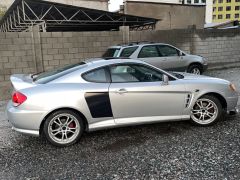 Photo of the vehicle Hyundai Coupe