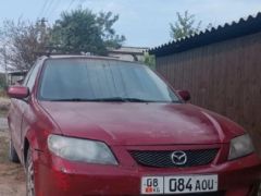 Сүрөт унаа Mazda 323