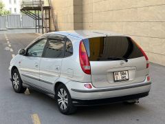 Фото авто Nissan Almera Tino